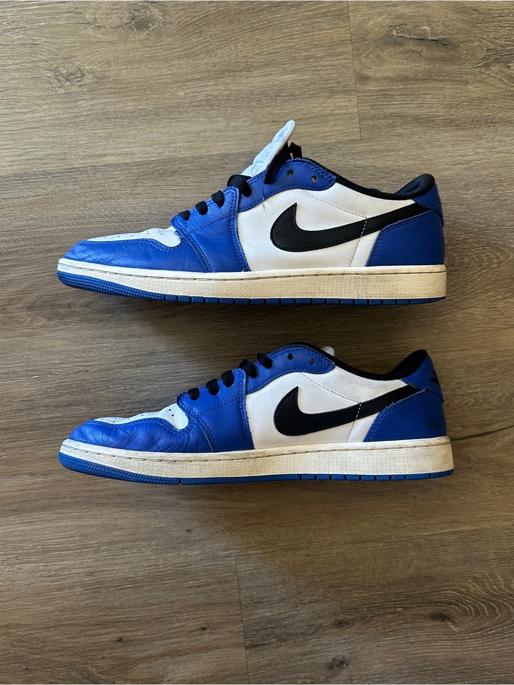 Jordan Low Top Sneakers in White, Blue, and Black